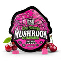 Pink packaging of TRE House Extra Strength Mushroom Gummies Sour Cherry flavor with cherries around.